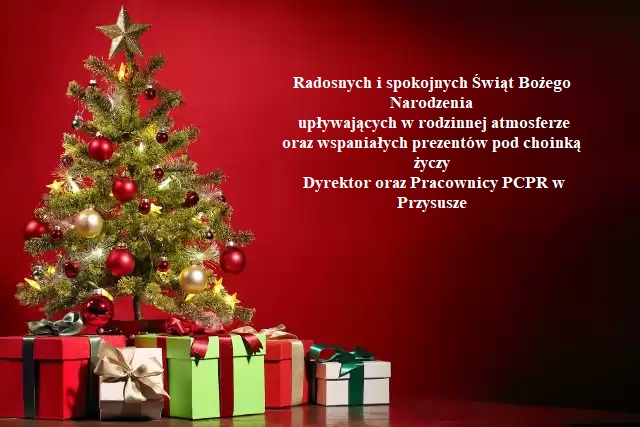 życzenia świąteczne 2023, na zdjęicu znajduje się ubrana choinka oraz życzenia świąteczne: radosnych i spokojnych świąt Bożego Narodzenia życzy Dyrektor oraz Pracownicy PCPR w Przysusze 